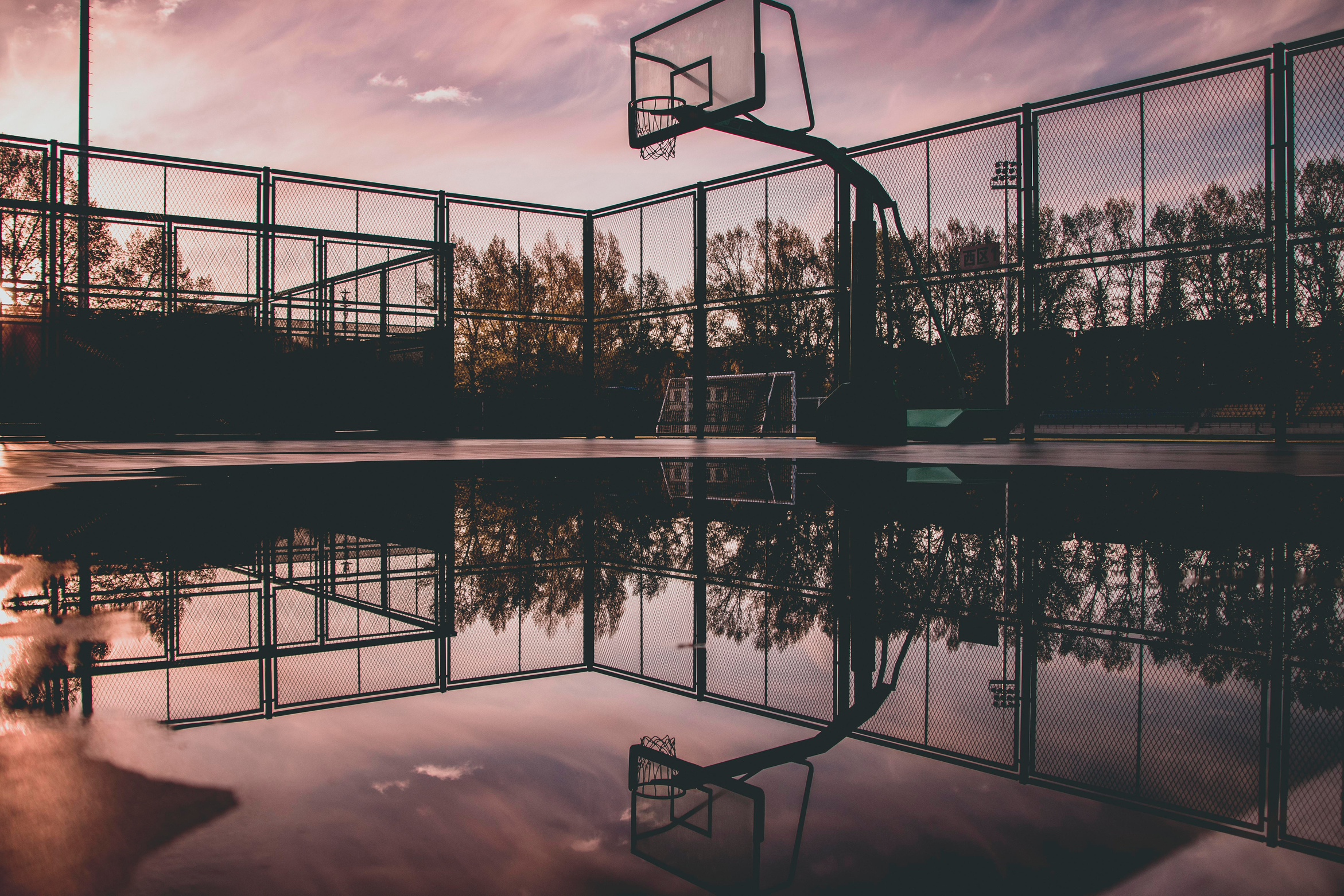 Basketball Hoop Reflecting on Water